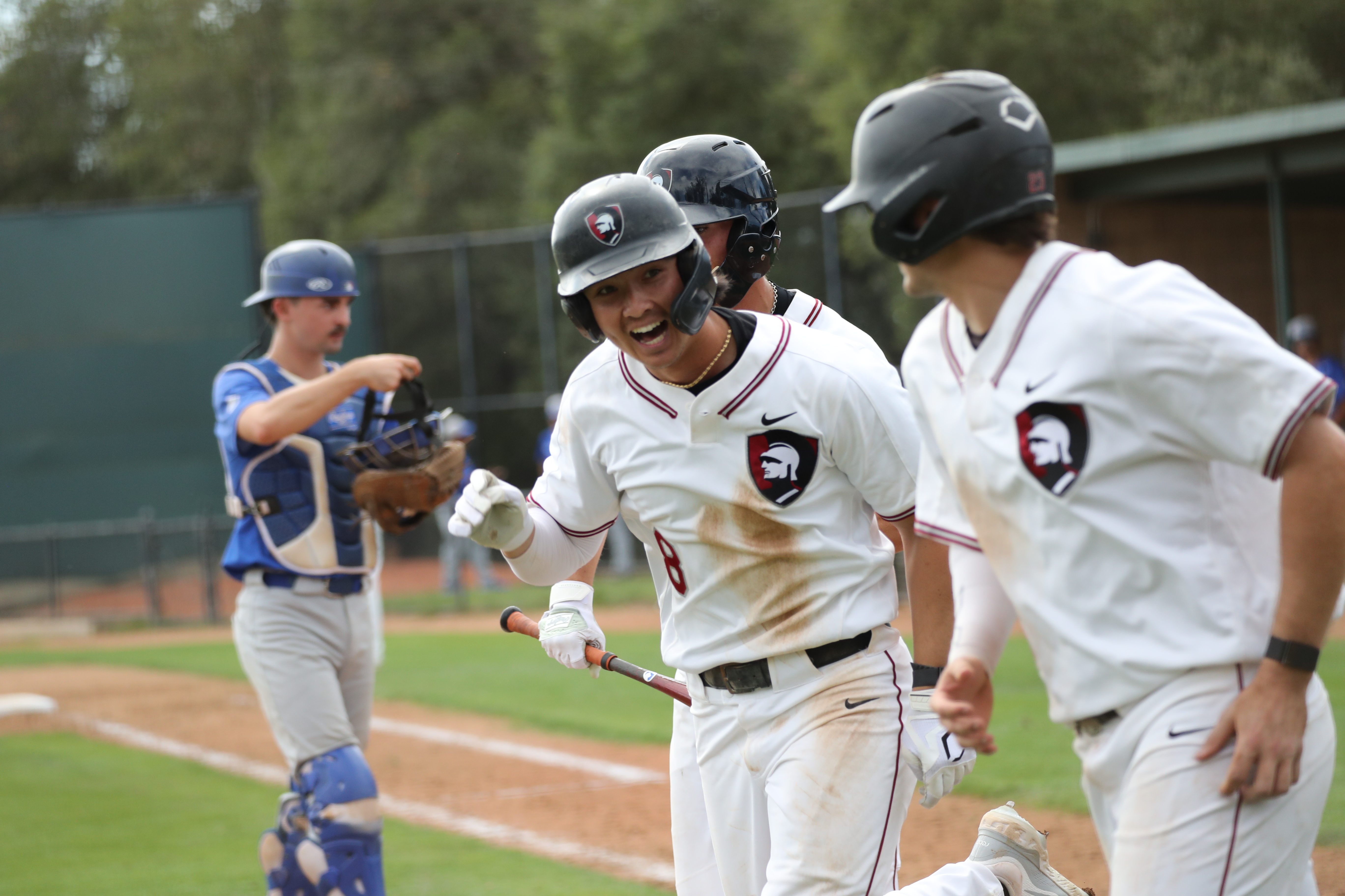 westmont baseball players celebrating