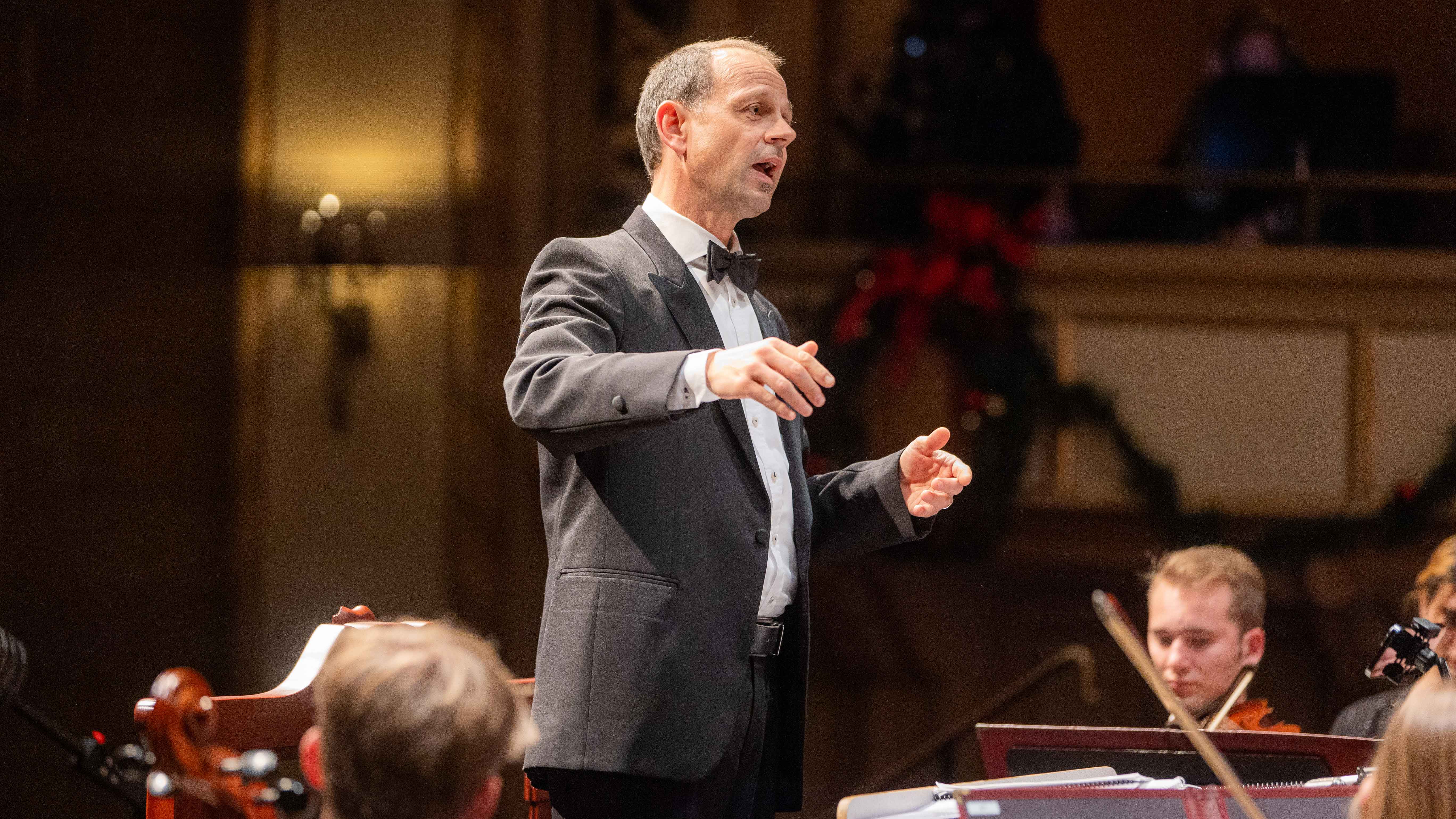 Siegwart ‘Zig’ Reichwald conducting his first Westmont Christmas Festival in 2022