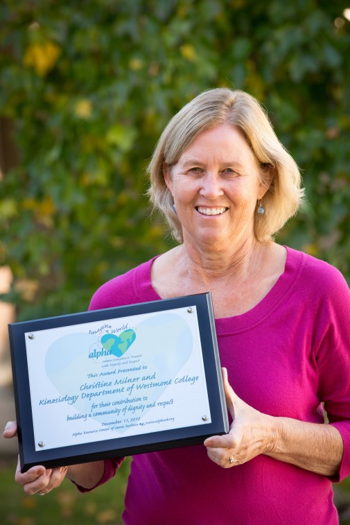 Professor Christine Milner with the Imagine a World Award 