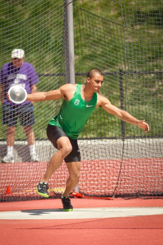 Ashton Eaton throws the discus at the Sam Adams Classic in 2012