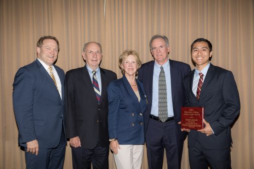 John Moore poses with Stefan Inouye. Also pictured: President Gayle D. Beebe, Pete and Gerd Jordano