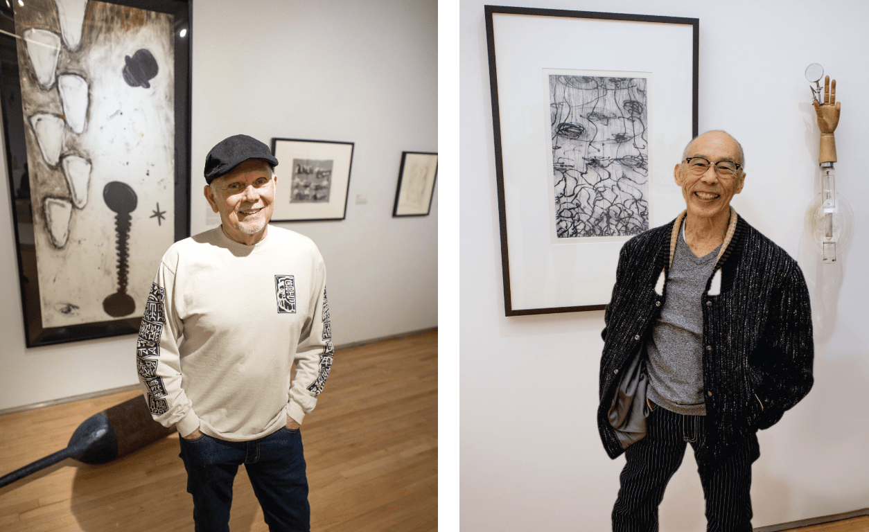 Dane Goodman & Dug Uyesaka standing by their artworks.